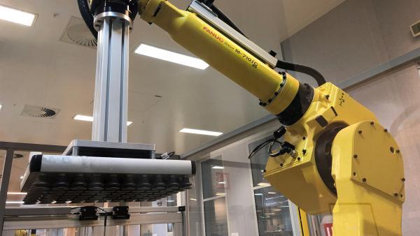 Robot presse conçu par RobOptic